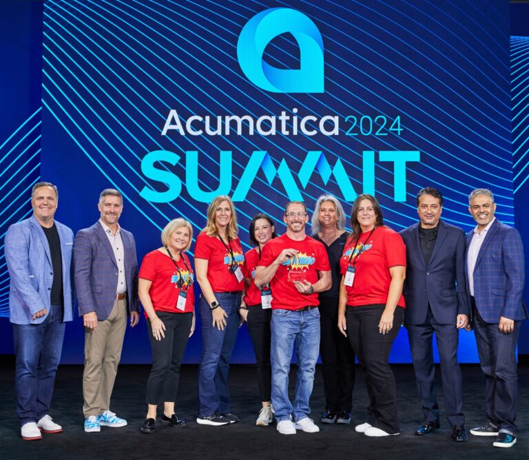 Workforce Go team accepts their award from Acumatica for Excellence in construction integrations.