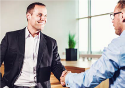 two men shaking hands